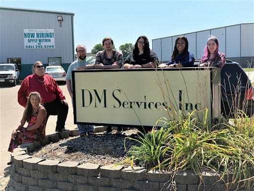 Group photo of DM Services employees